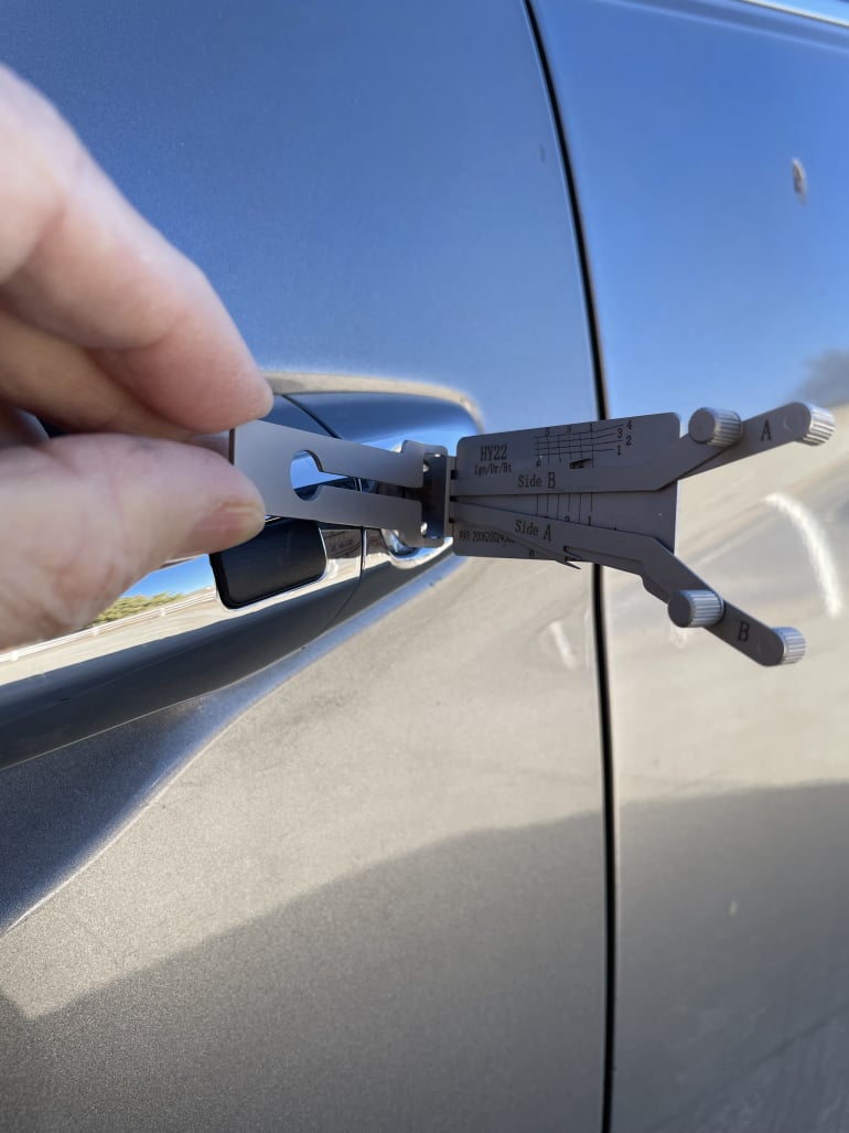 Car lockout using a special tool to unlock it.